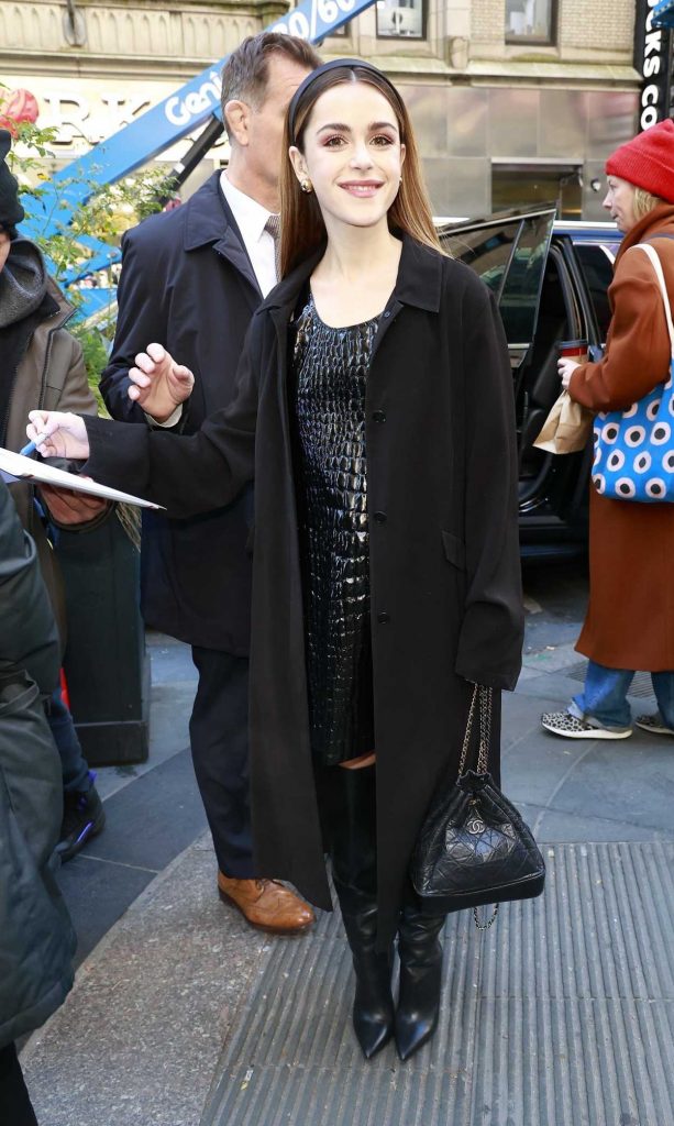 Kiernan Shipka in a Black Coat