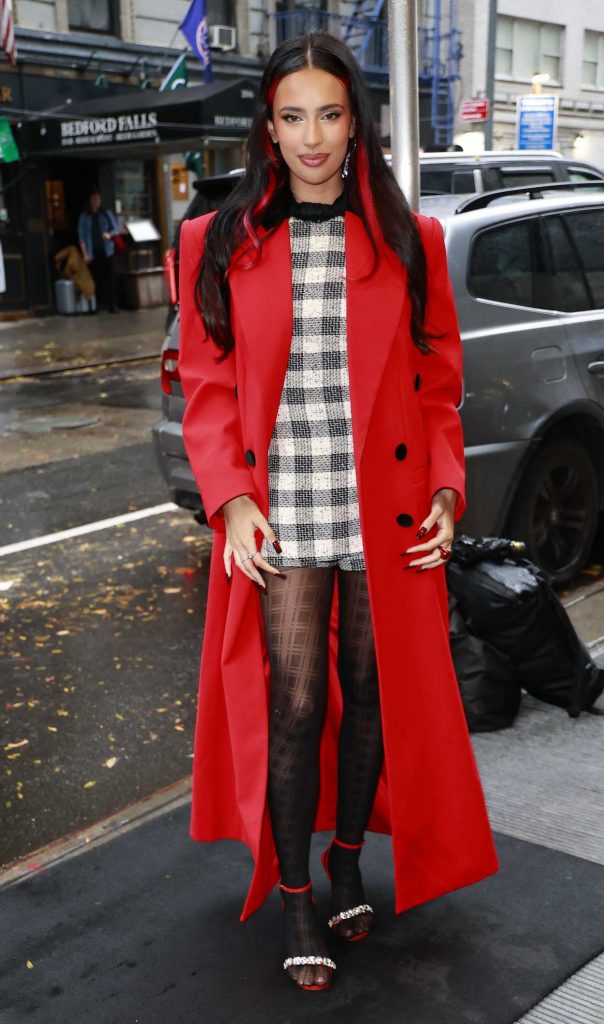 Kylie Cantrall in a Red Coat