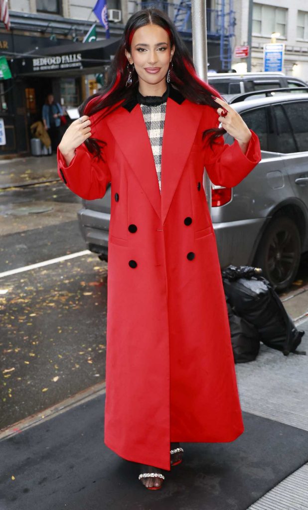 Kylie Cantrall in a Red Coat