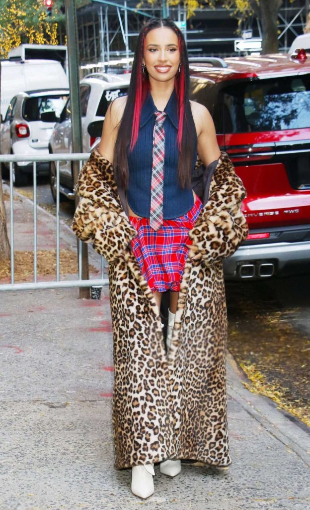 Kylie Cantrall in an Animal Print Fur Coat