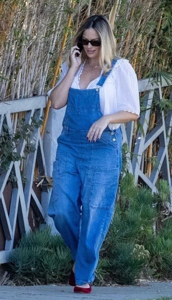 Margot Robbie in a Blue Denim Jumpsuit