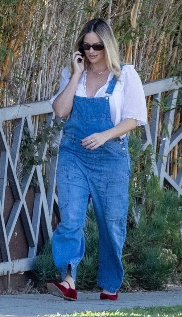 Margot Robbie in a Blue Denim Jumpsuit