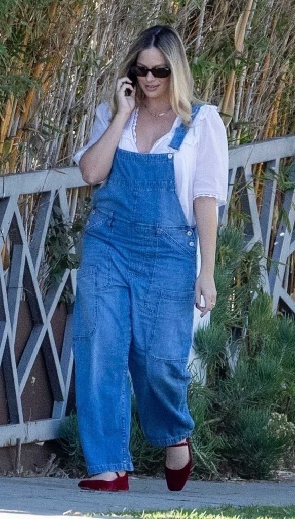 Margot Robbie in a Blue Denim Jumpsuit