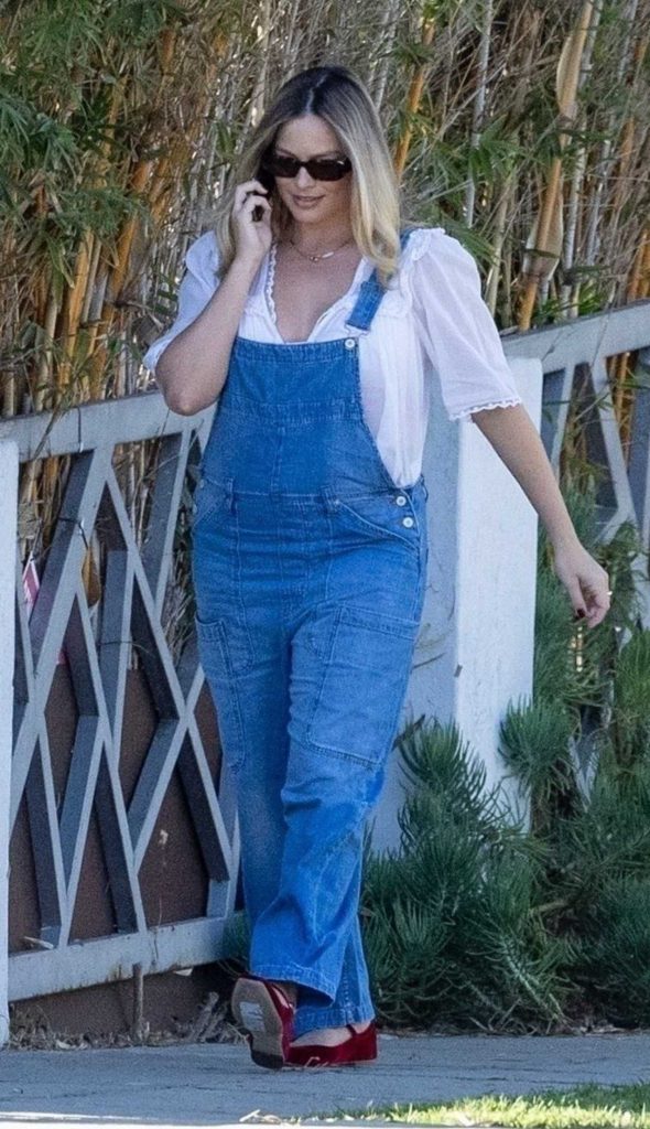 Margot Robbie in a Blue Denim Jumpsuit