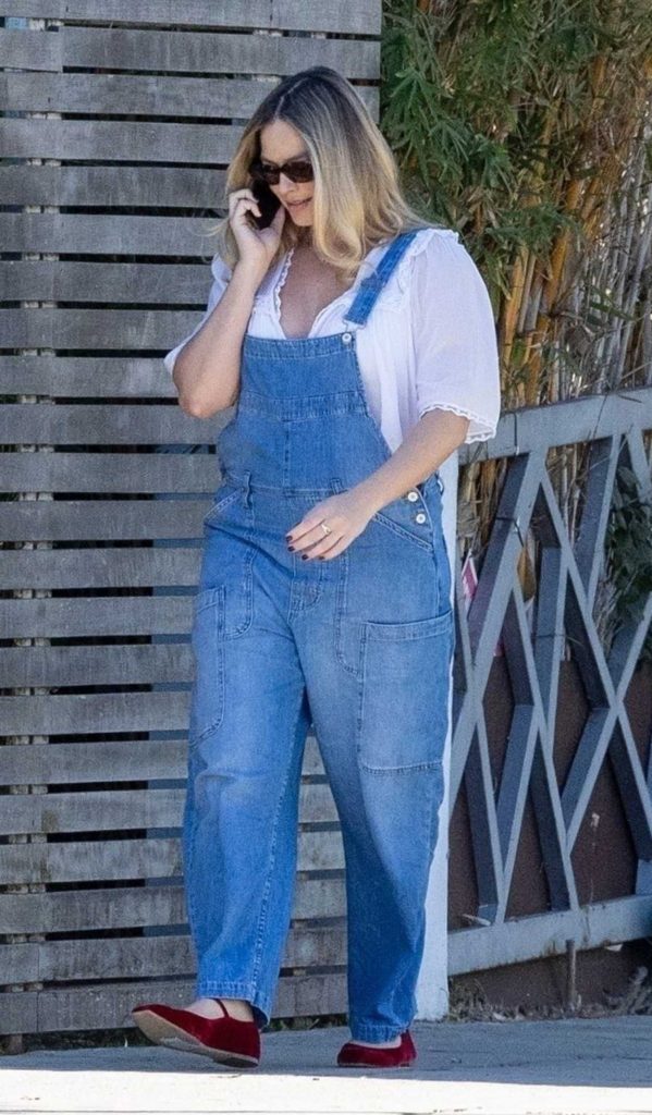 Margot Robbie in a Blue Denim Jumpsuit