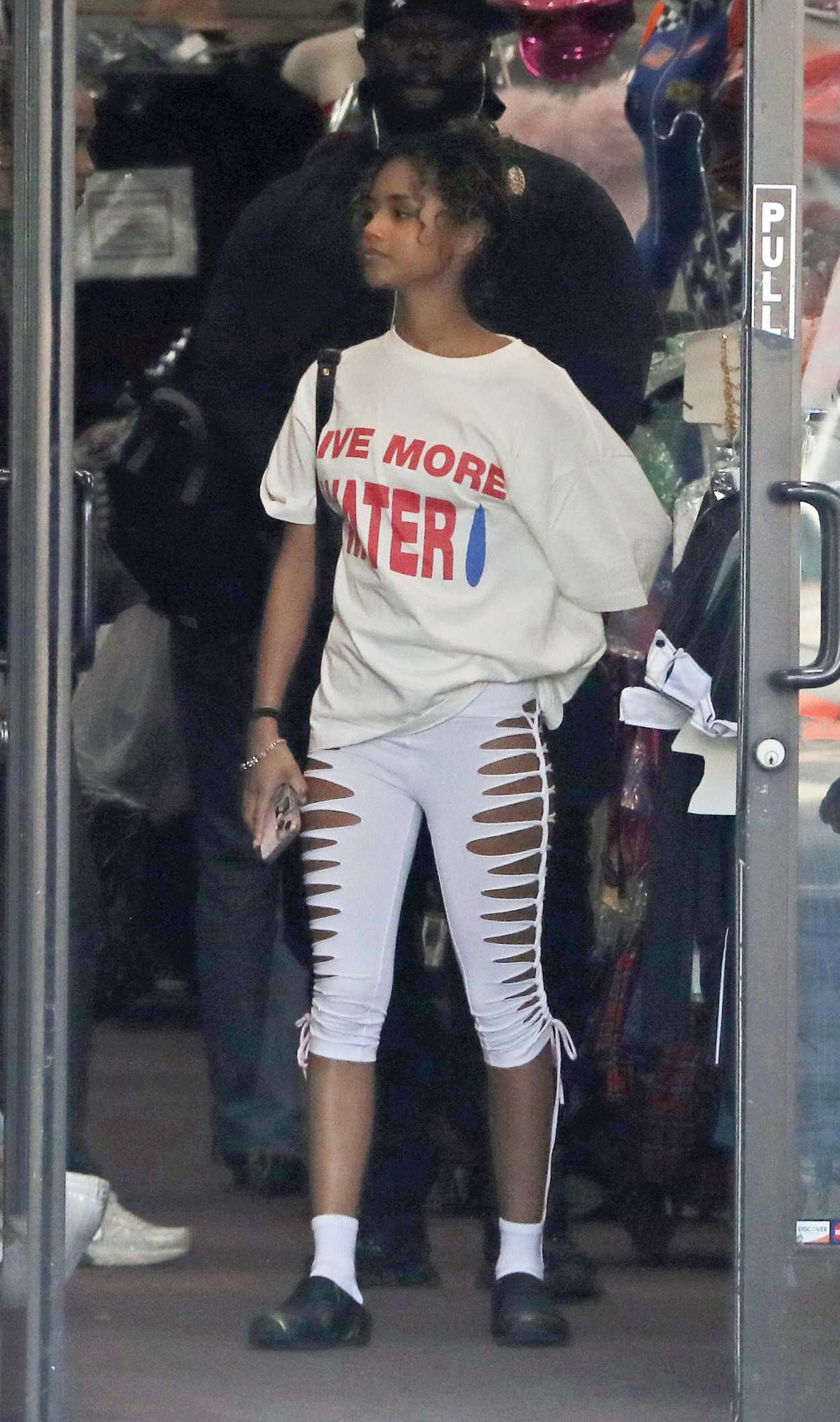 Tyla in a White Tee Browses Halloween Costumes at a Store in Hollywood