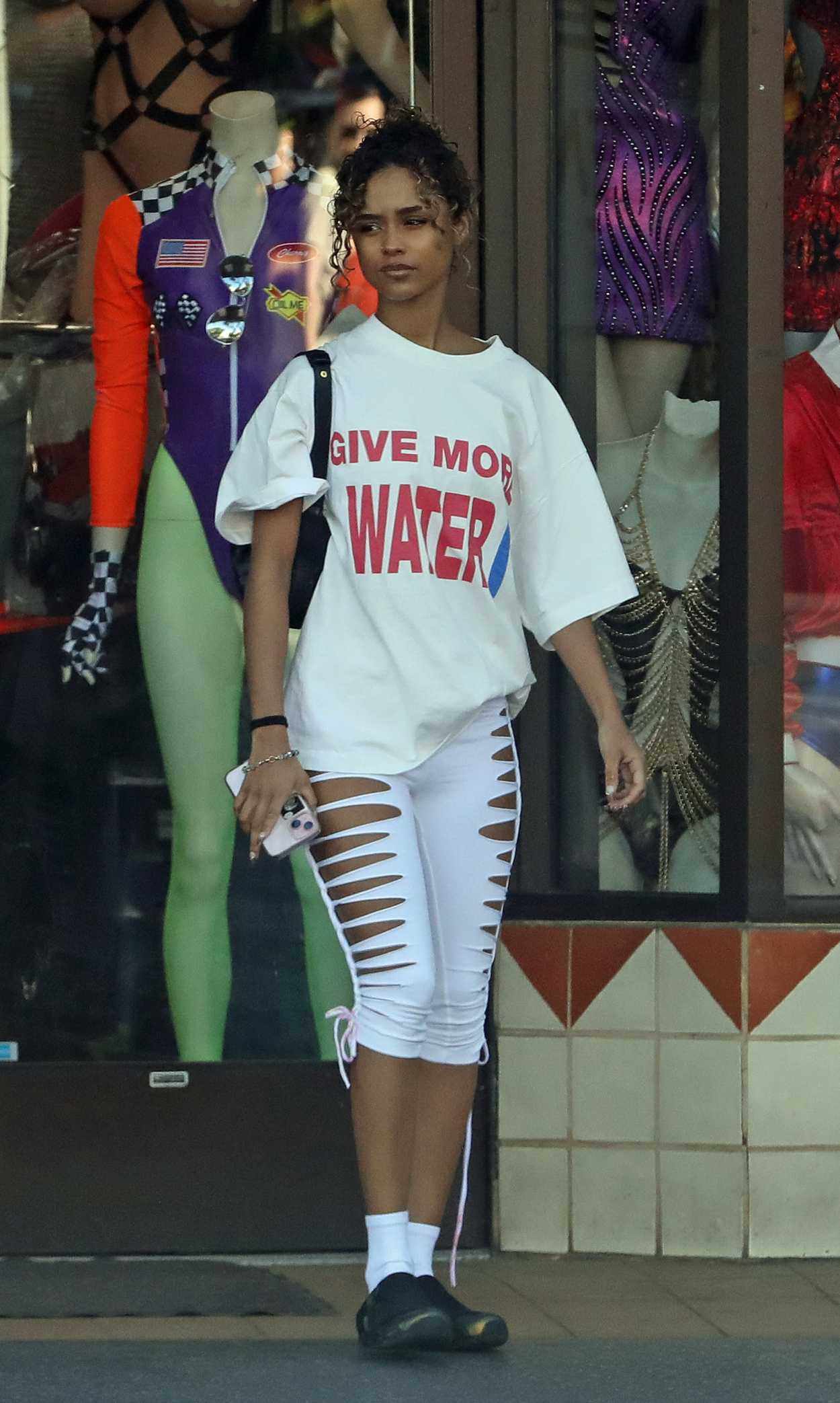 Tyla in a White Tee Browses Halloween Costumes at a Store in Hollywood