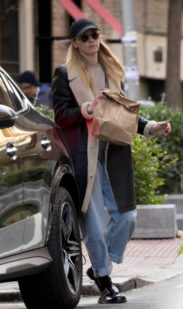 Amber Heard in a Black Cap