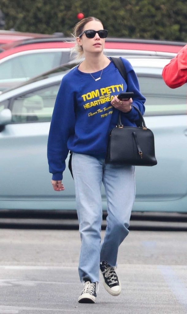 Ashley Benson in a Blue Sweatshirt