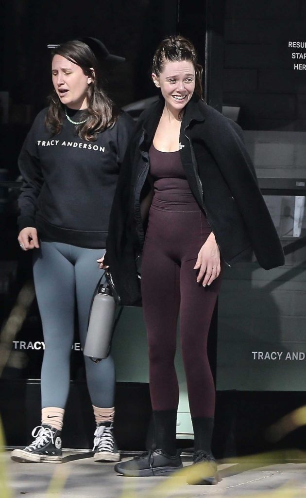 Elizabeth Olsen in a Black Sneakers