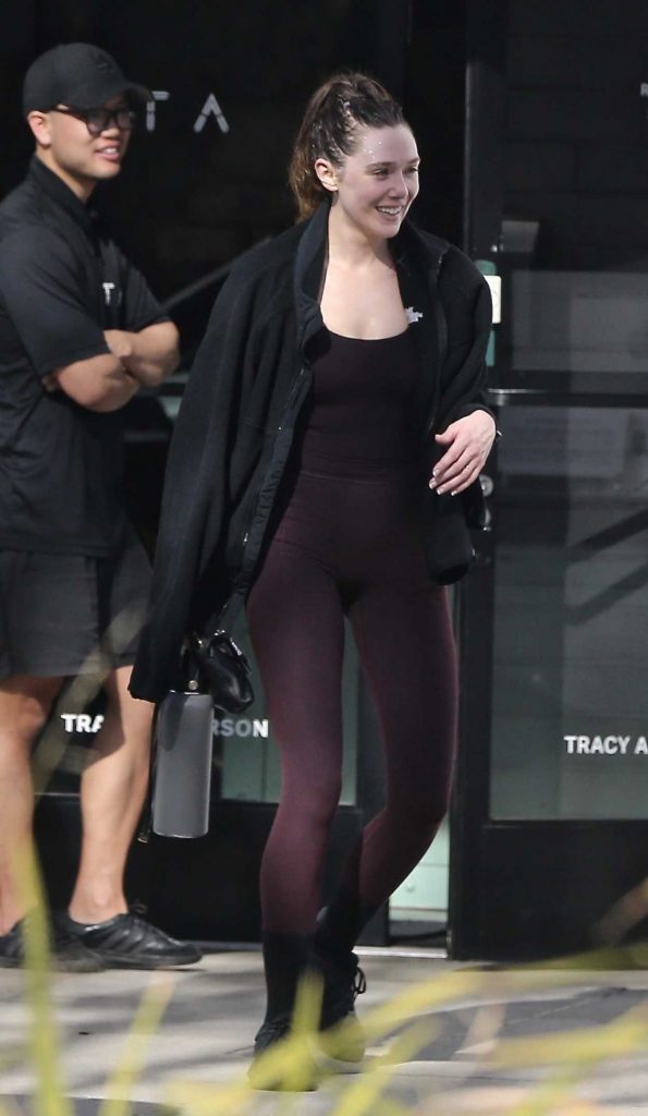 Elizabeth Olsen in a Black Sneakers