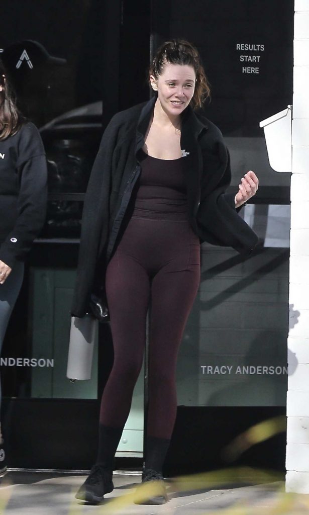 Elizabeth Olsen in a Black Sneakers