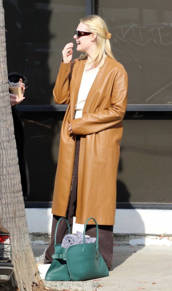 Elle Fanning in a Caramel Coloured Leather Coat