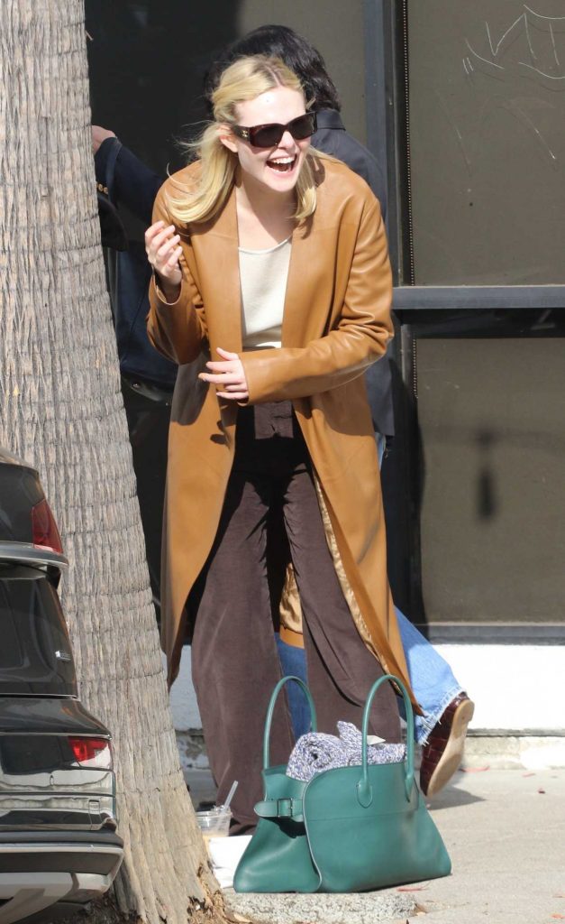 Elle Fanning in a Caramel Coloured Leather Coat