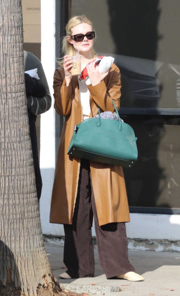 Elle Fanning in a Caramel Coloured Leather Coat