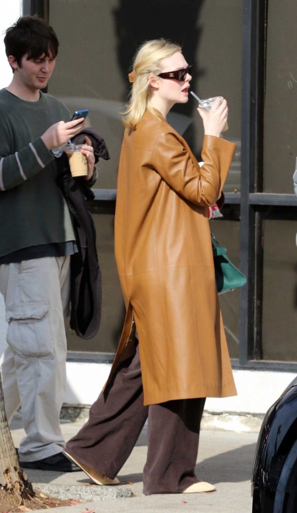 Elle Fanning in a Caramel Coloured Leather Coat