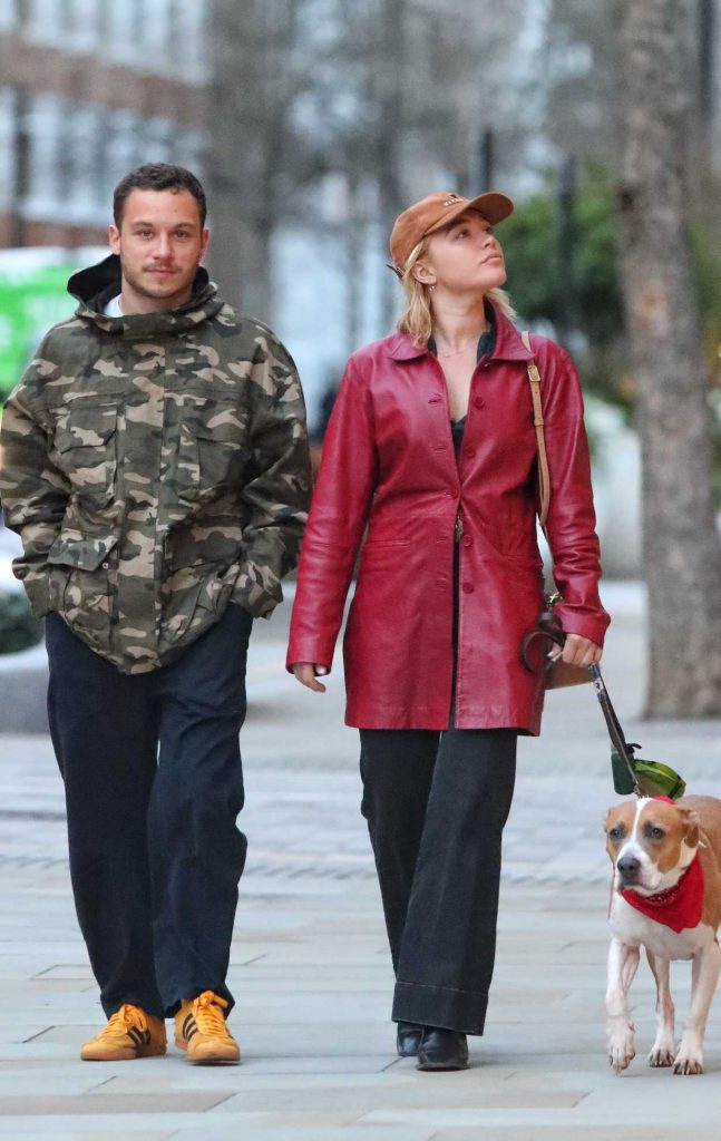 Florence Pugh in a Red Leather Trench Coat