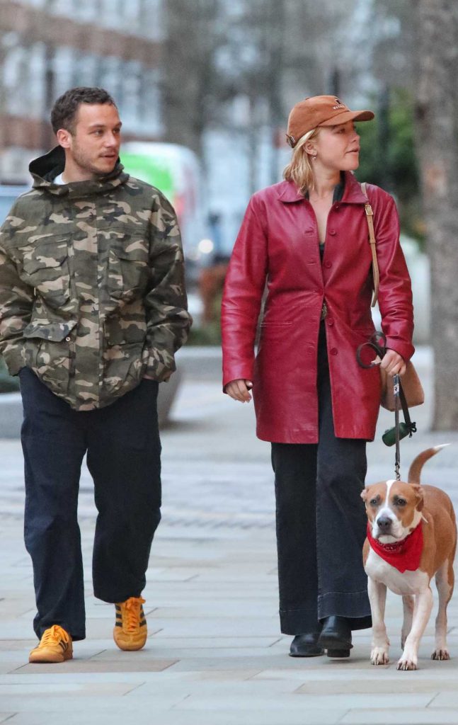 Florence Pugh in a Red Leather Trench Coat