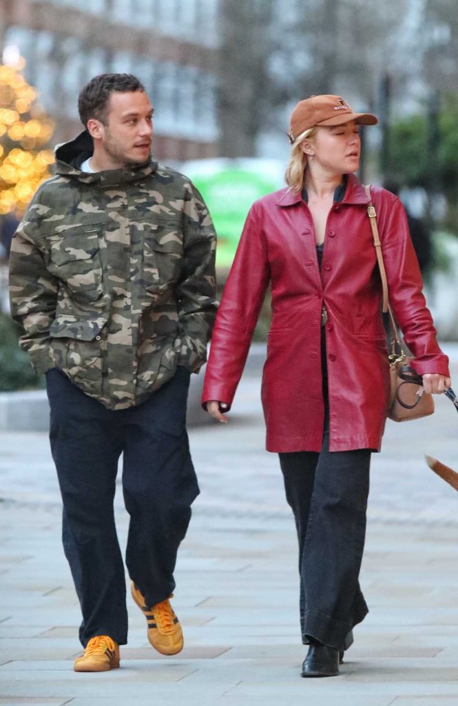 Florence Pugh in a Red Leather Trench Coat