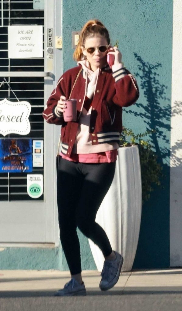 Kate Mara in a Black Leggings