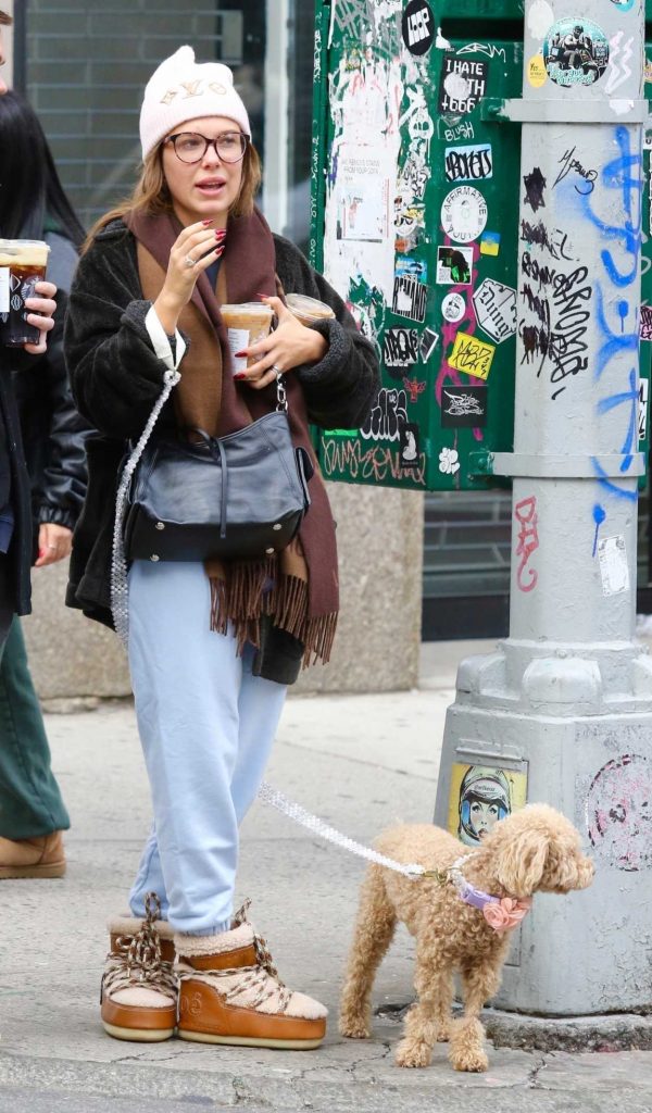 Millie Bobby Brown in a White Beanie Hat