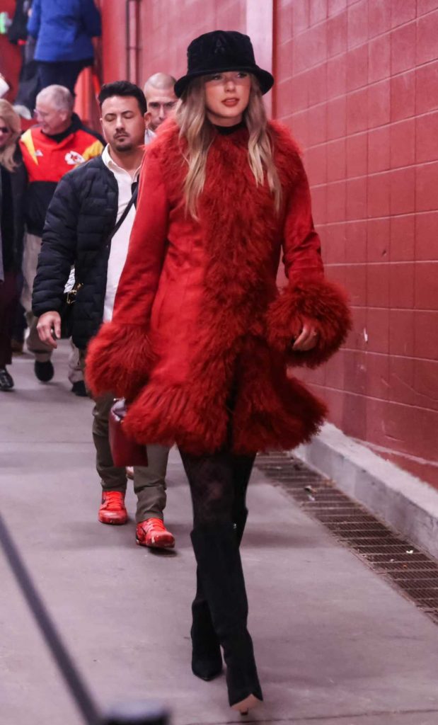 Taylor Swift in a Red Sheepskin Coat