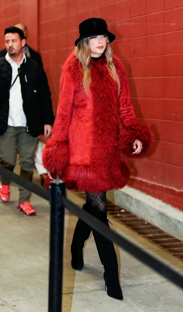 Taylor Swift in a Red Sheepskin Coat