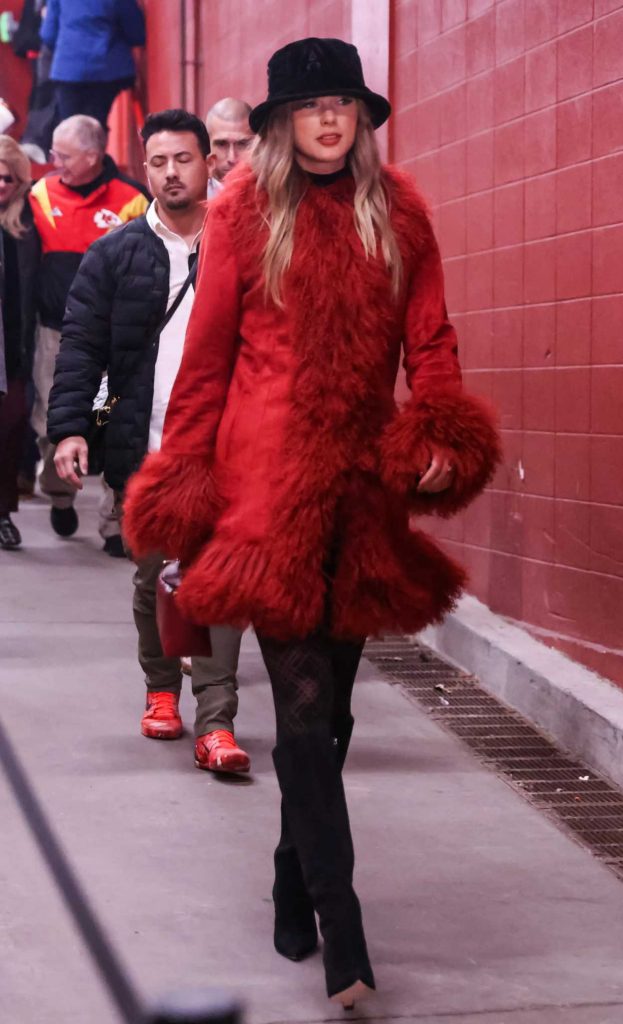 Taylor Swift in a Red Sheepskin Coat