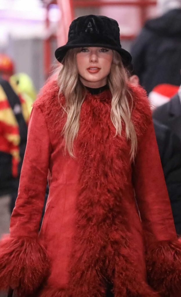 Taylor Swift in a Red Sheepskin Coat