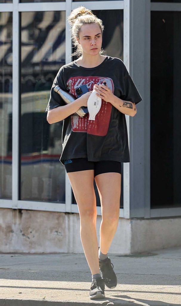 Cara Delevingne in a Black Tee