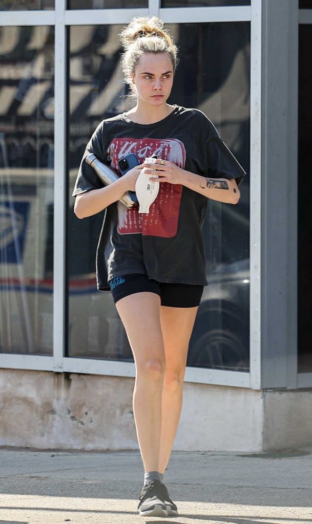 Cara Delevingne in a Black Tee