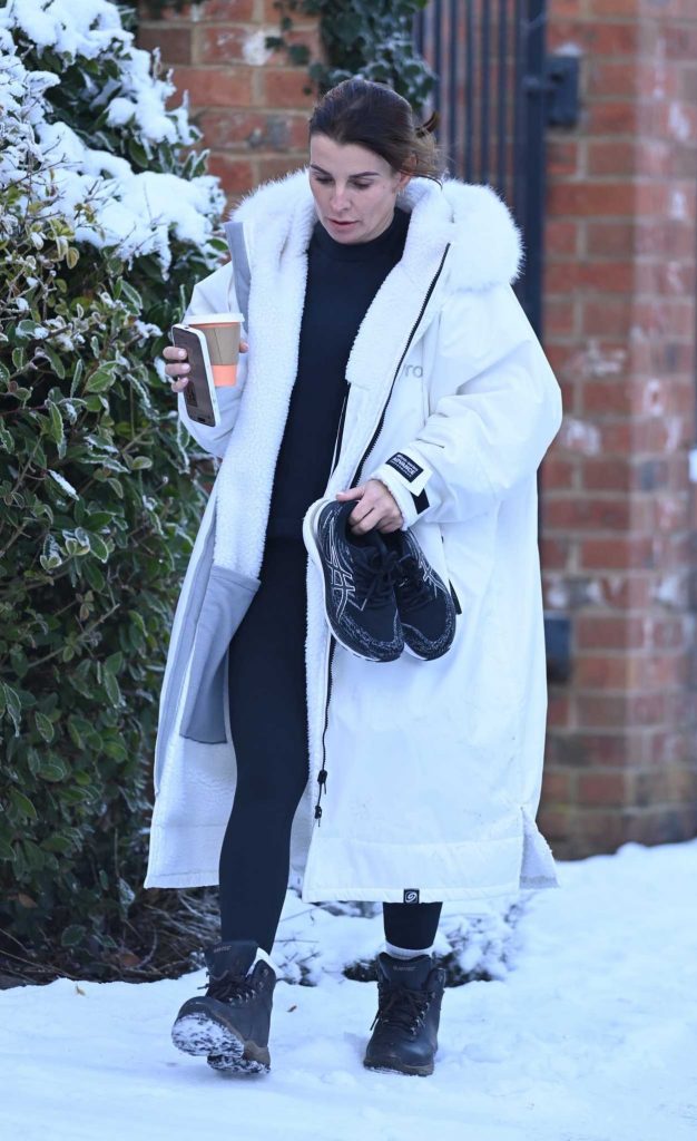 Coleen Rooney in a White Puffer Coat