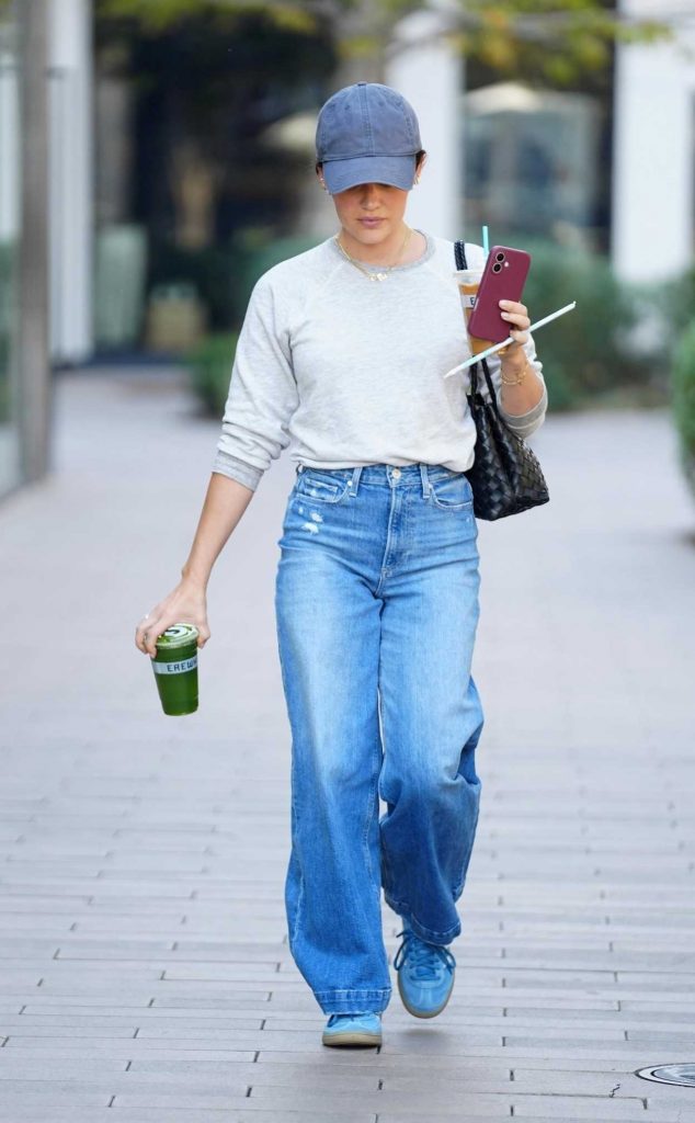 Lucy Hale in a Blue Cap