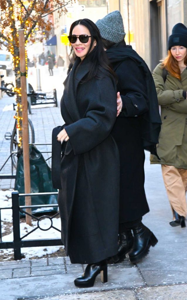 Lucy Liu in a Black Coat