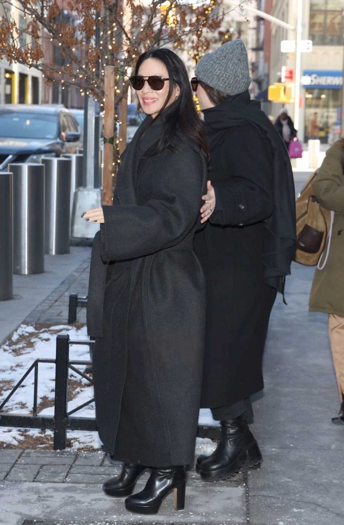 Lucy Liu in a Black Coat