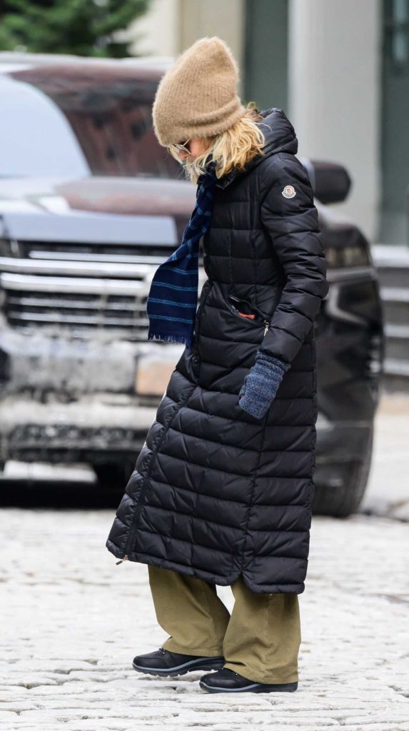 Meg Ryan in a Black Puffer Coat