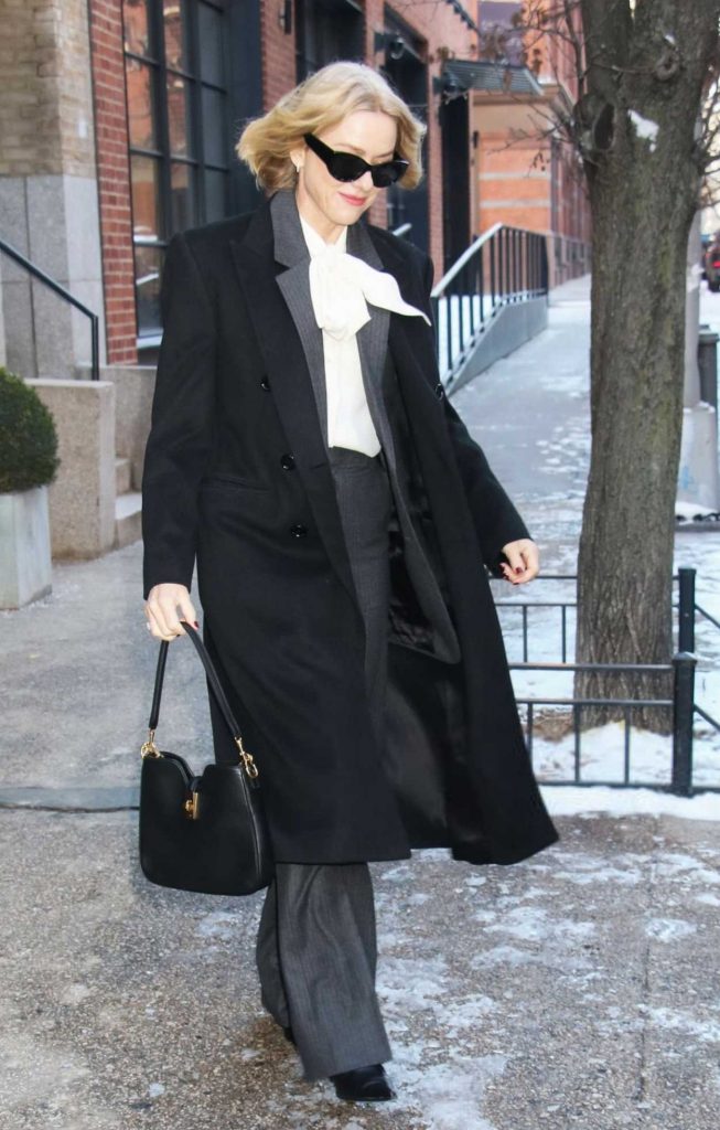 Naomi Watts in a Black Coat