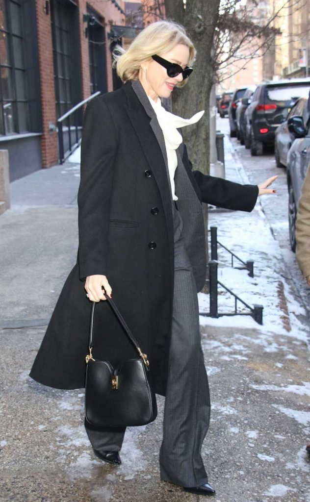 Naomi Watts in a Black Coat