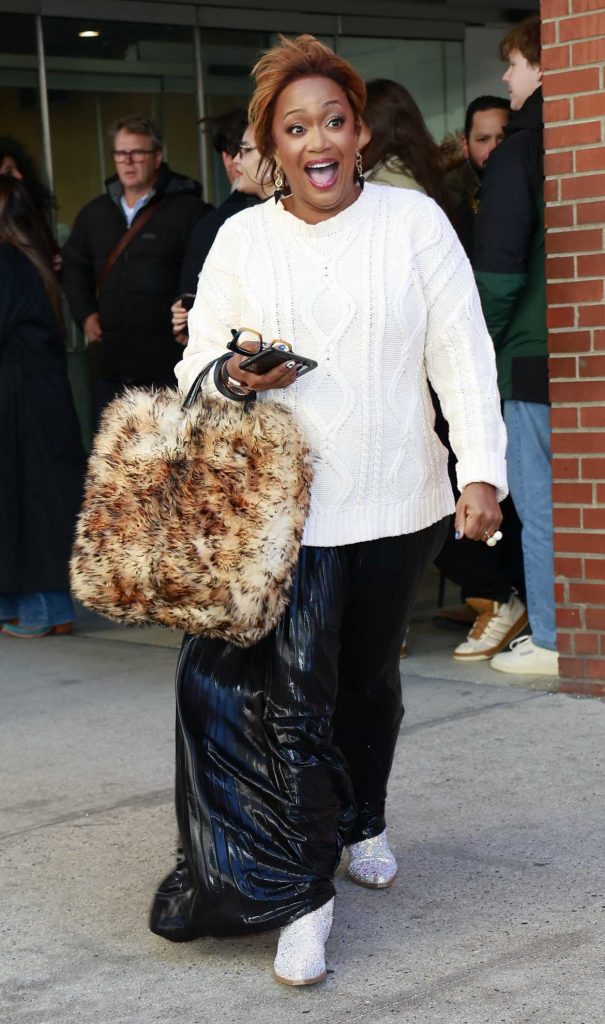 Sunny Anderson in a White Sweater