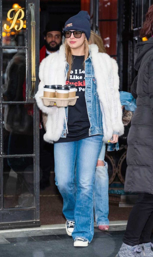 Addison Rae in a White Fur Jacket