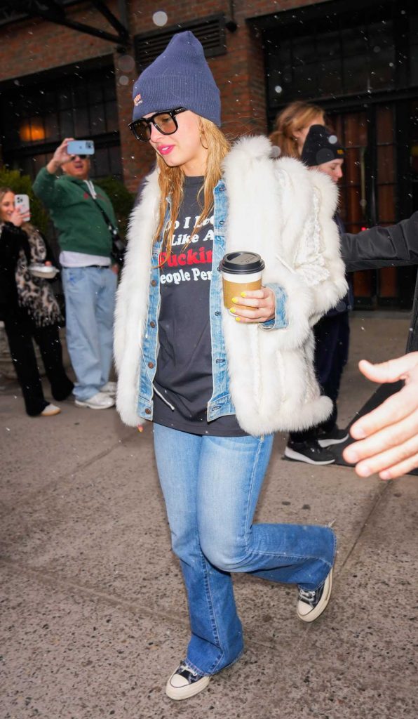 Addison Rae in a White Fur Jacket