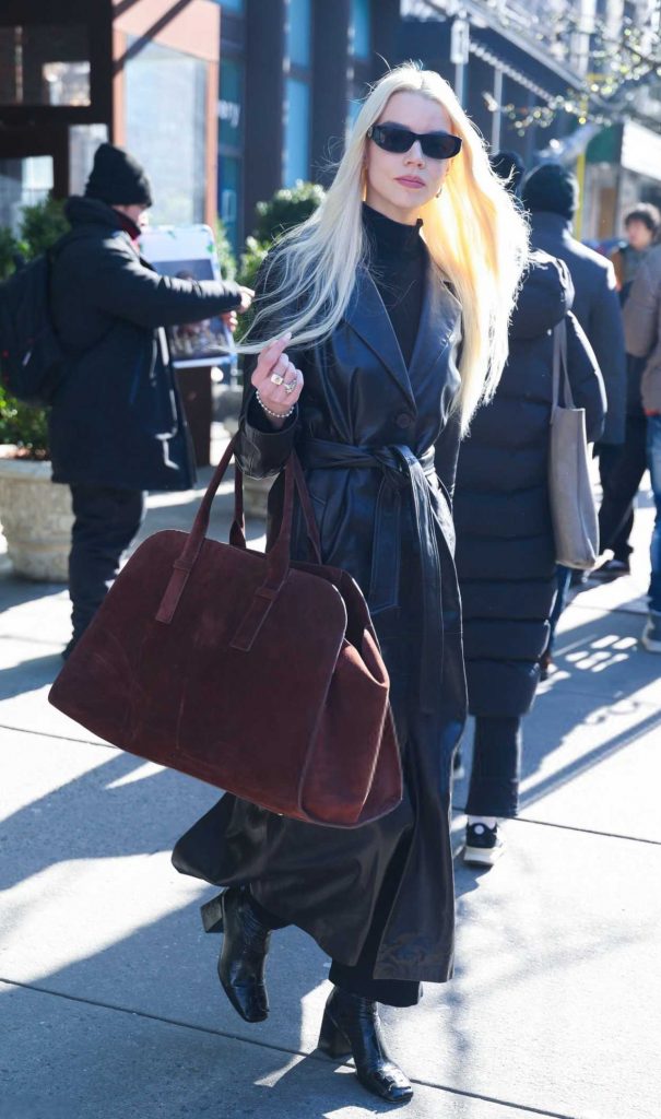 Anya Taylor-Joy in a Black Leather Coat