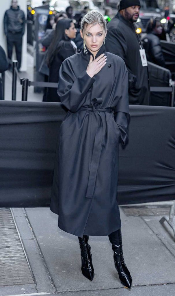 Elsa Hosk in a Black Trench Coat