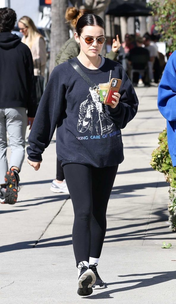 Lucy Hale in a Black Sneakers