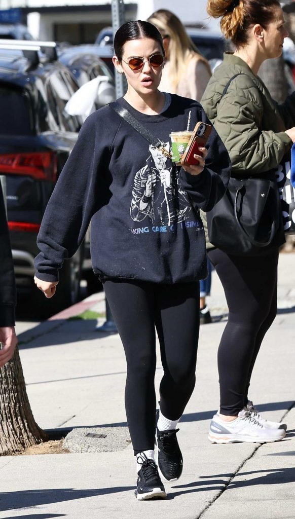 Lucy Hale in a Black Sneakers