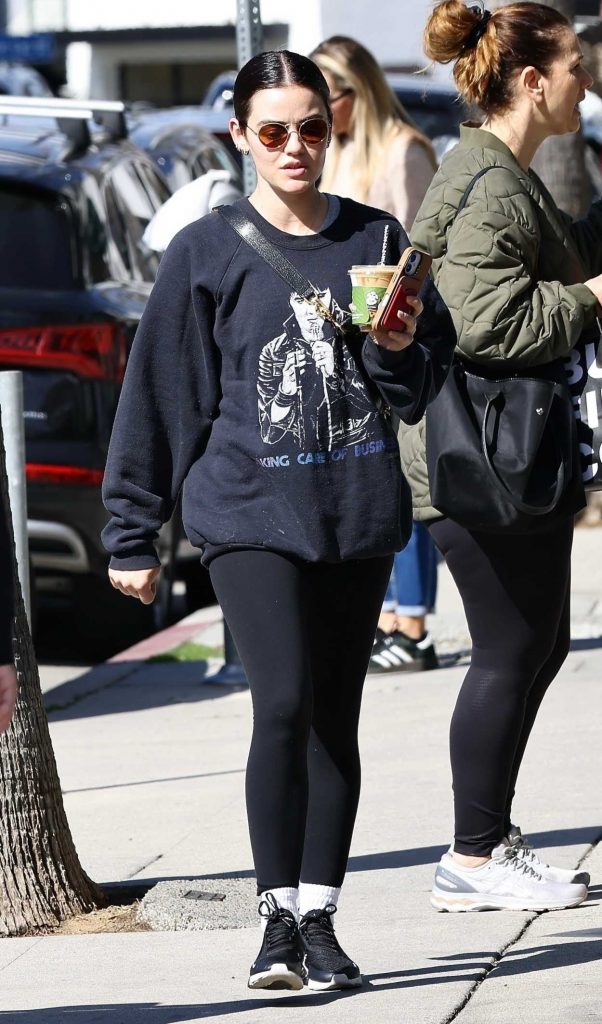 Lucy Hale in a Black Sneakers