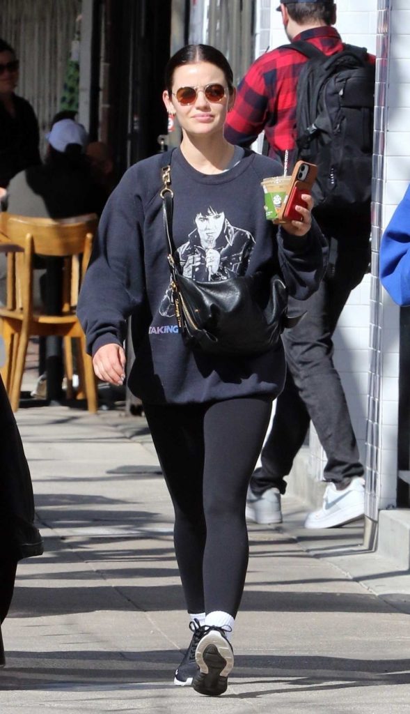 Lucy Hale in a Black Sneakers