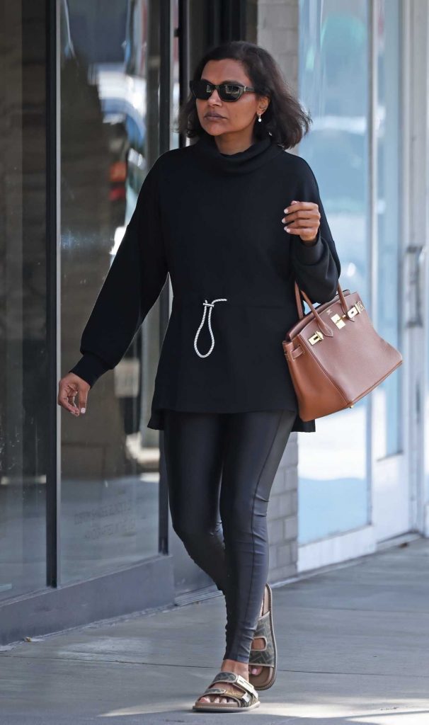 Mindy Kaling in a Black Turtleneck