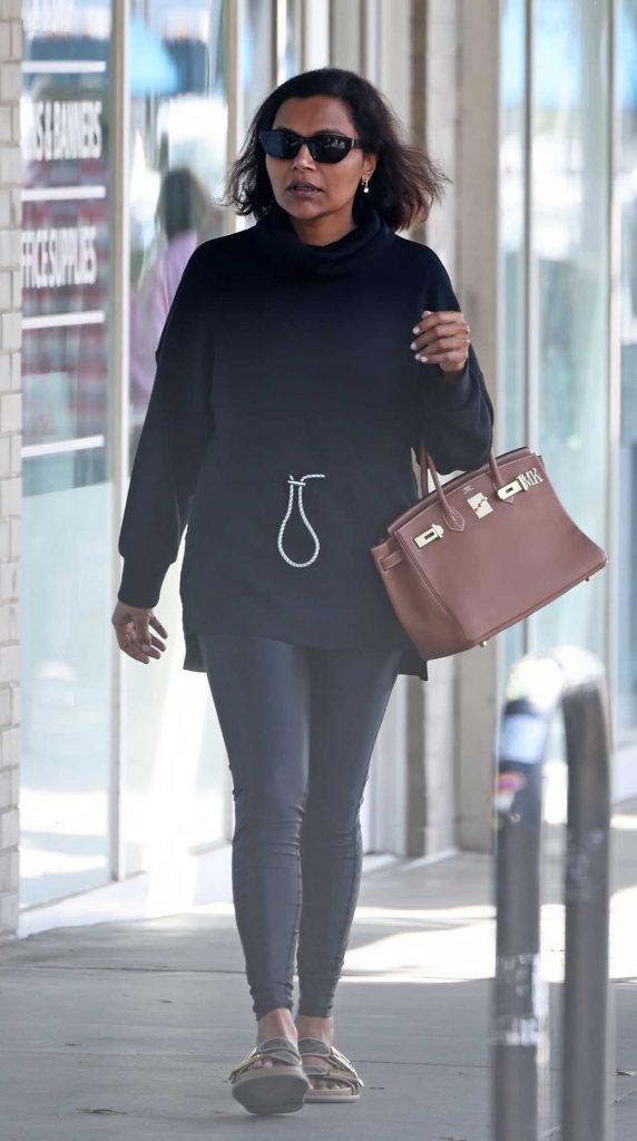 Mindy Kaling in a Black Turtleneck