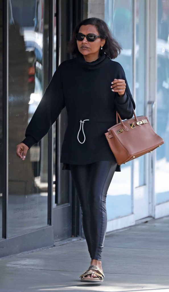 Mindy Kaling in a Black Turtleneck